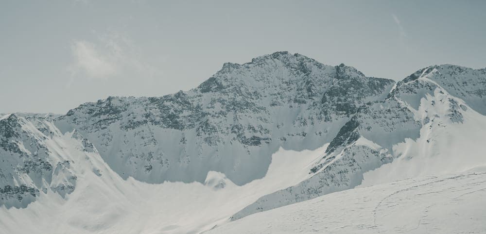 Snow-covered mountain peaks in winter